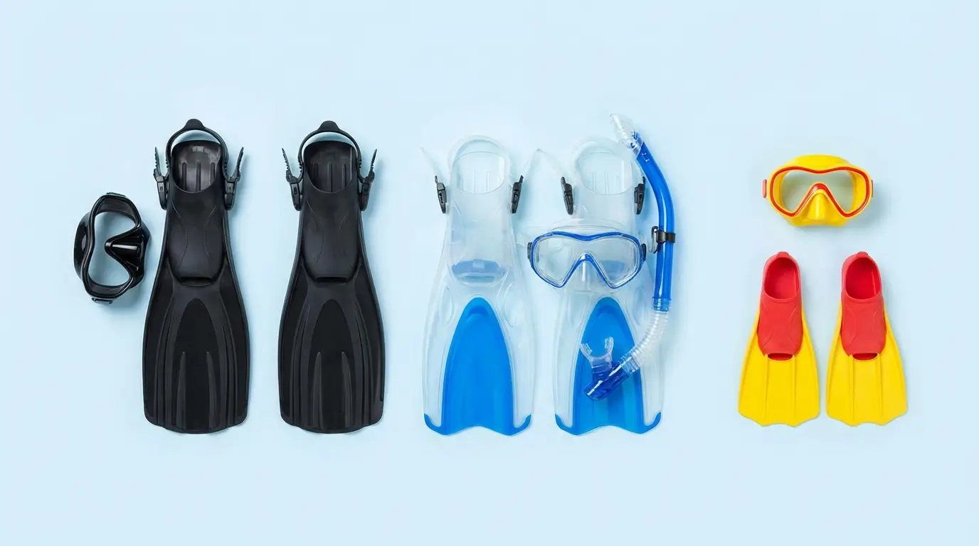 Flat lay of diving equipment across market segments — scuba masks, snorkel sets, and children's masks